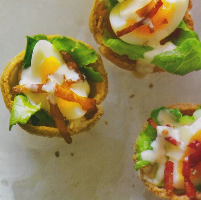 picture of Caesar salad tarts with quail eggs
 Canape